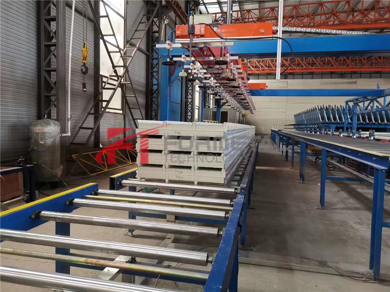 New Design Stacking for Sandwich Panel Machine